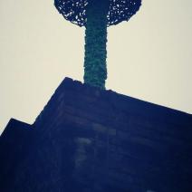 A green mushroom on top of a building!