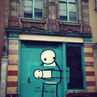 Stik blends in with the general color of the building, teal.